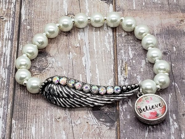 silver angel wing stretch bracelet believe charm